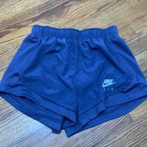 Like new! Women’s nike air shorts. Size S. Color is a bluish/purplish (see pics)